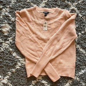 Soft coral pink express sweater. Knitted